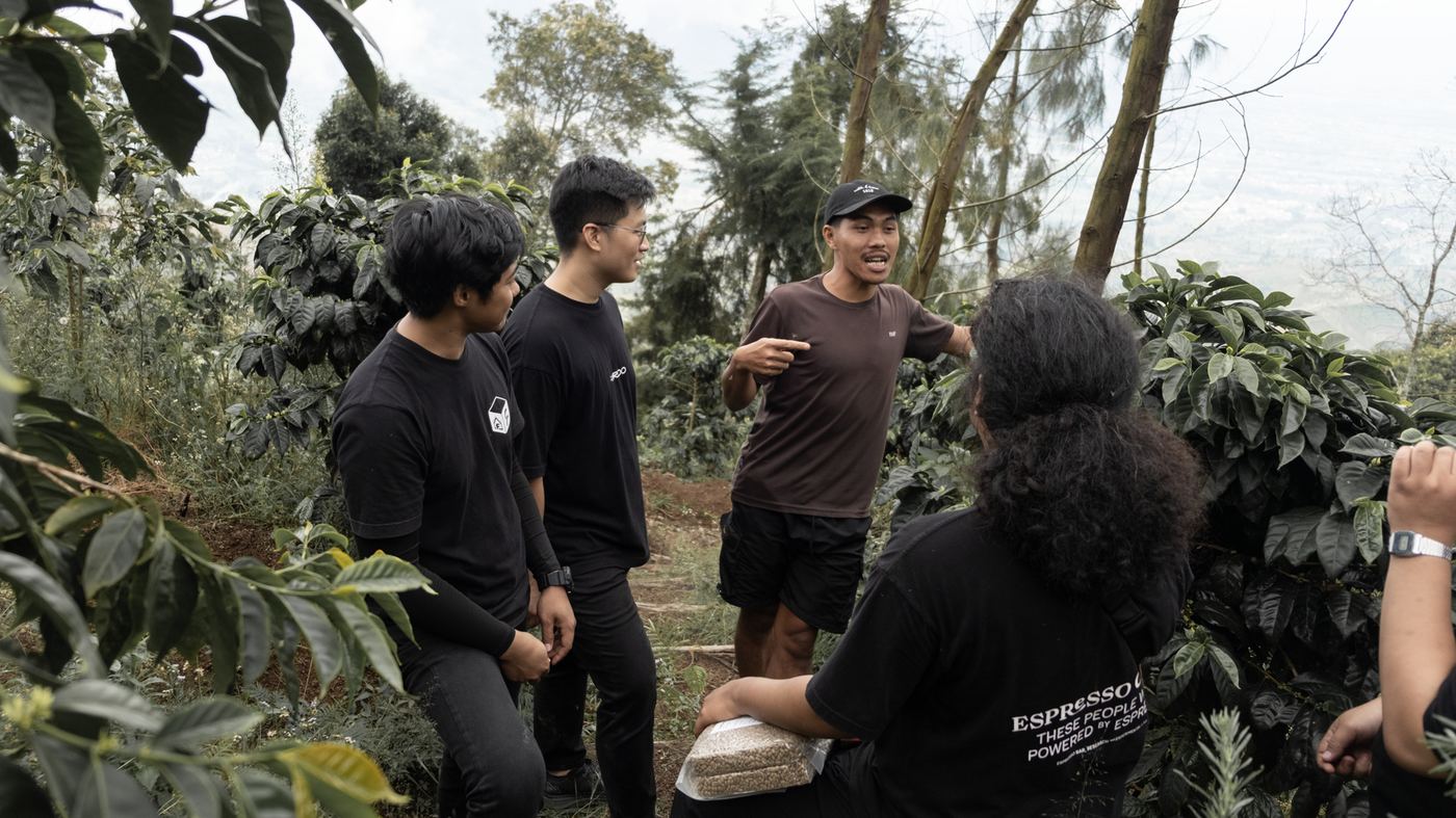 Fordo team walking the Petarangan plot with the farmer